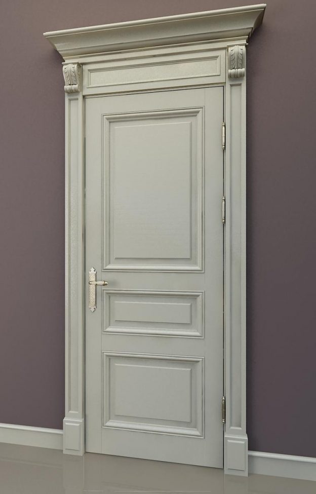 Белая дверь с установленными наличниками